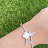 Butterflies Bangle for women in 925 Sterling Silver – delicate butterfly motifs, blooms and flowers, ships worldwide (UAE, USA, KSA).