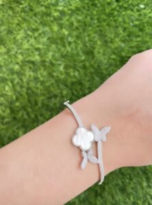 Butterflies Bangle for women in 925 Sterling Silver – delicate butterfly motifs, blooms and flowers, ships worldwide (UAE, USA, KSA).