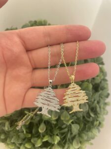 Arzeh Lebanon Necklace handcrafted in 925 sterling silver, featuring the iconic Lebanese cedar tree, available in silver and gold plating
