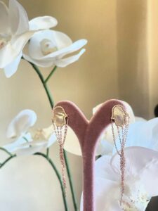 Hamsa Droplets Earrings in 925 sterling silver with rose gold plating, mother of pearl and zircon stones.