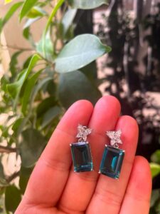 Jade Sparkle Earrings in 925 sterling silver with semi-precious jade stone, designed in Jordan. Jade Sparkle Earrings in 925 sterling silver with semi-precious jade stone, designed in Jordan.